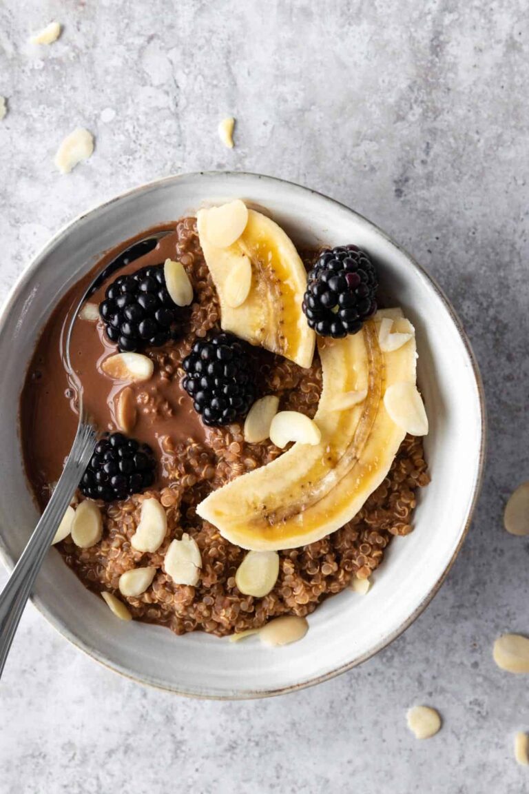quinoa chocolate bowl with banana, flaked almonds and blackberries