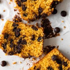 close up of three slices of chocolate chip pumpkin bread