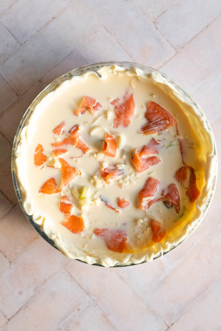 smoked salmon quiche on a baking dish before going to the oven
