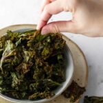 a bowl with baked kale chips