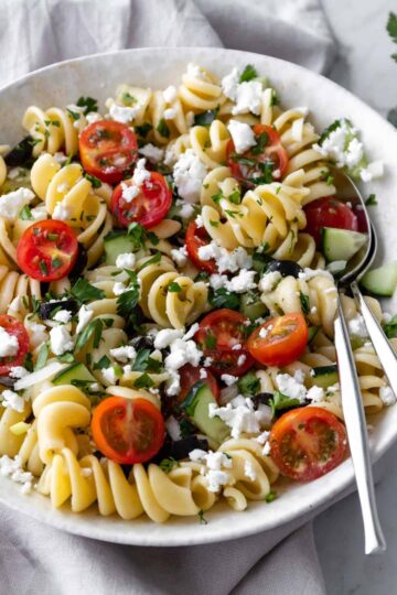 a bowl with a Greek pasta salad