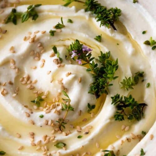 close up of whipped feta dip served on a bowl