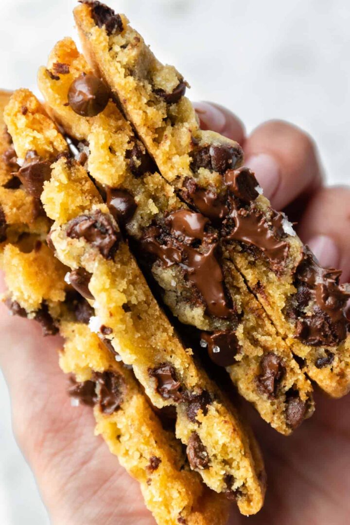 close-up of cookie halves with melted chocolate